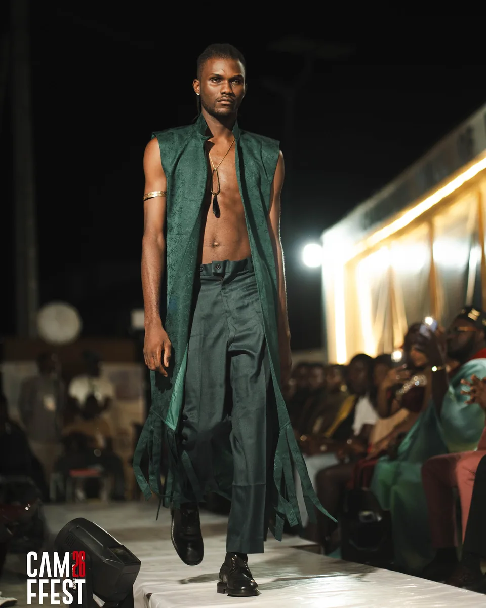 Model in a long green coat