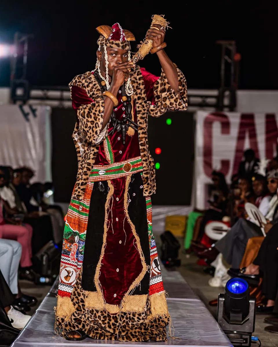Model in a leopard-print royal robe