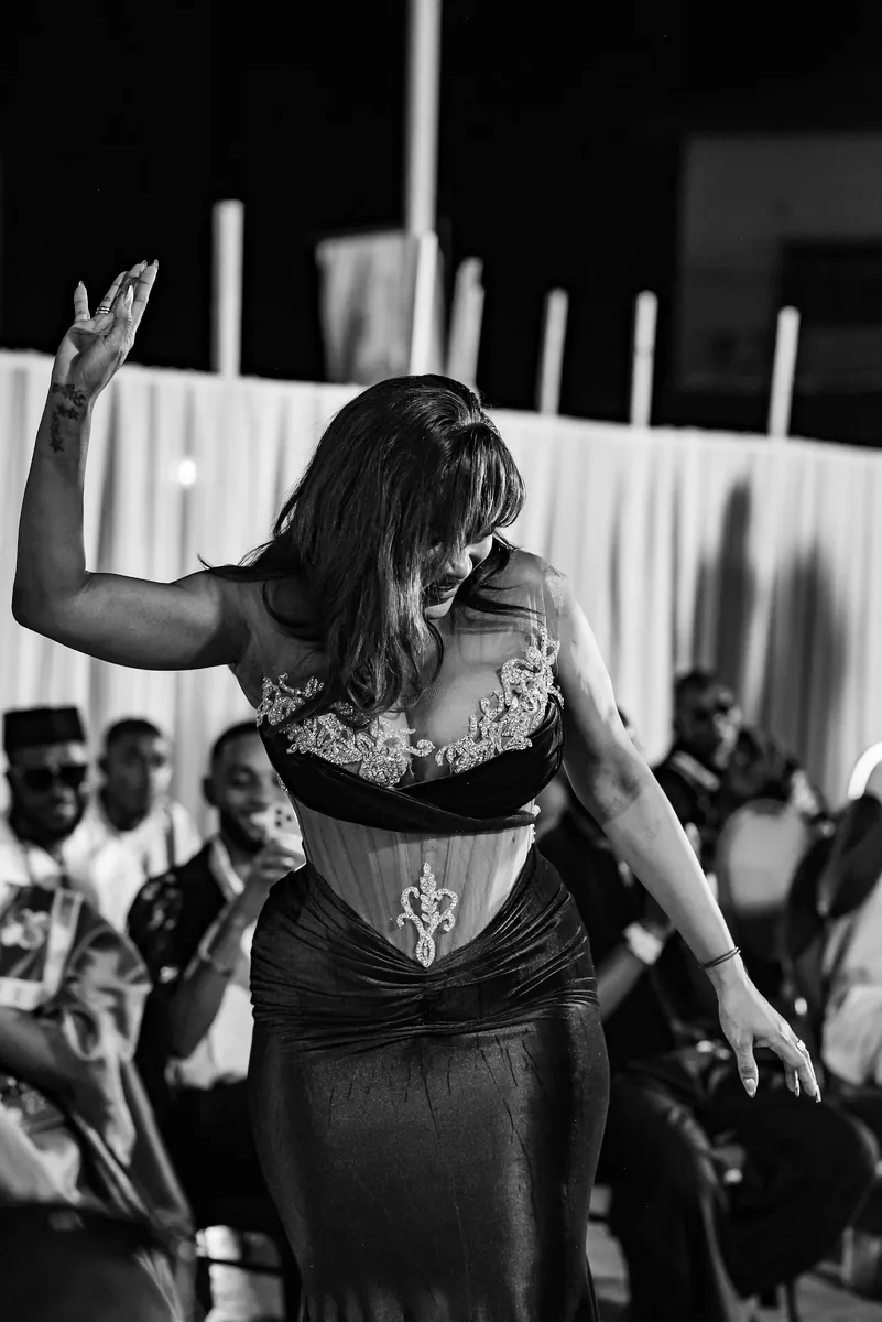 Guest dancing, in black and white
