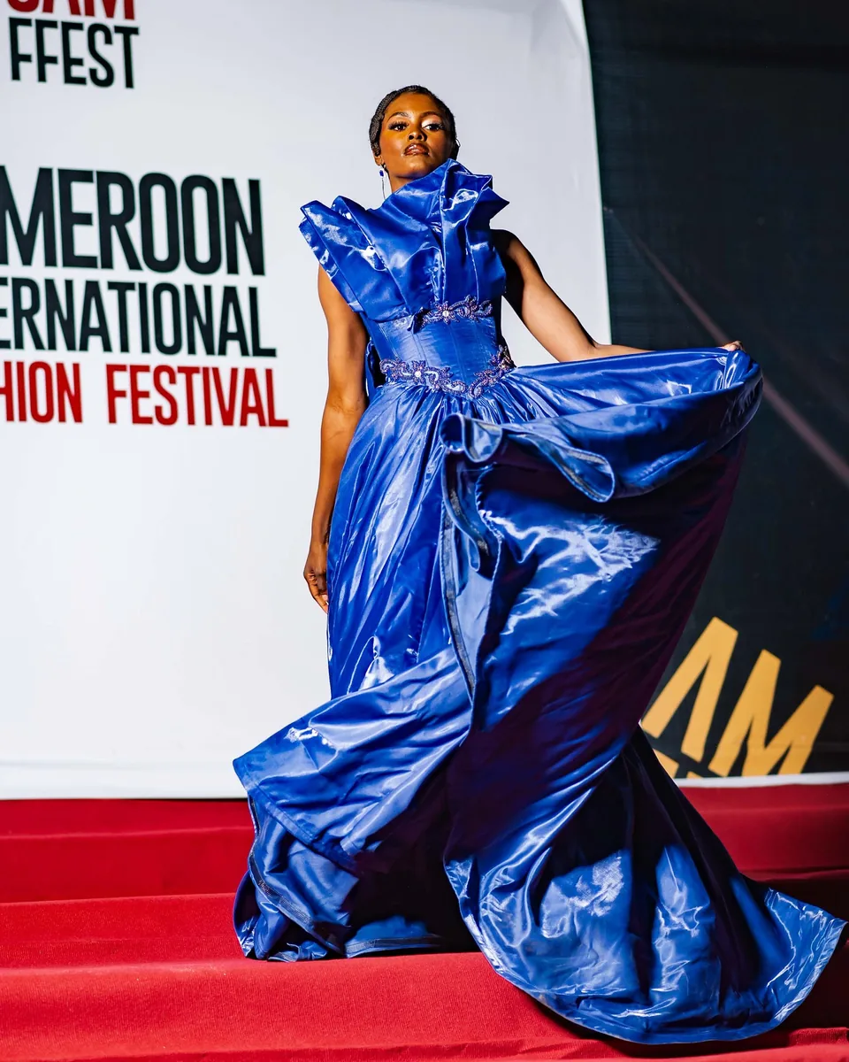 Model in a sweeping royal-blue gown